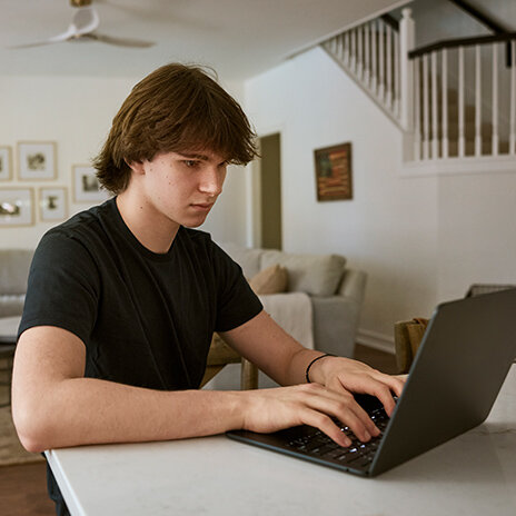 SMA advocate working on a laptop