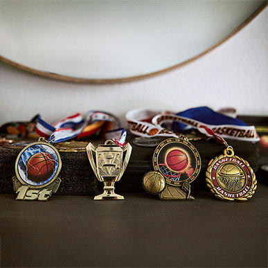 SMAshing limits medals collection - four medals sitting on desk