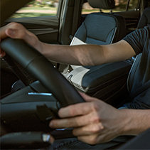 Person driving a car